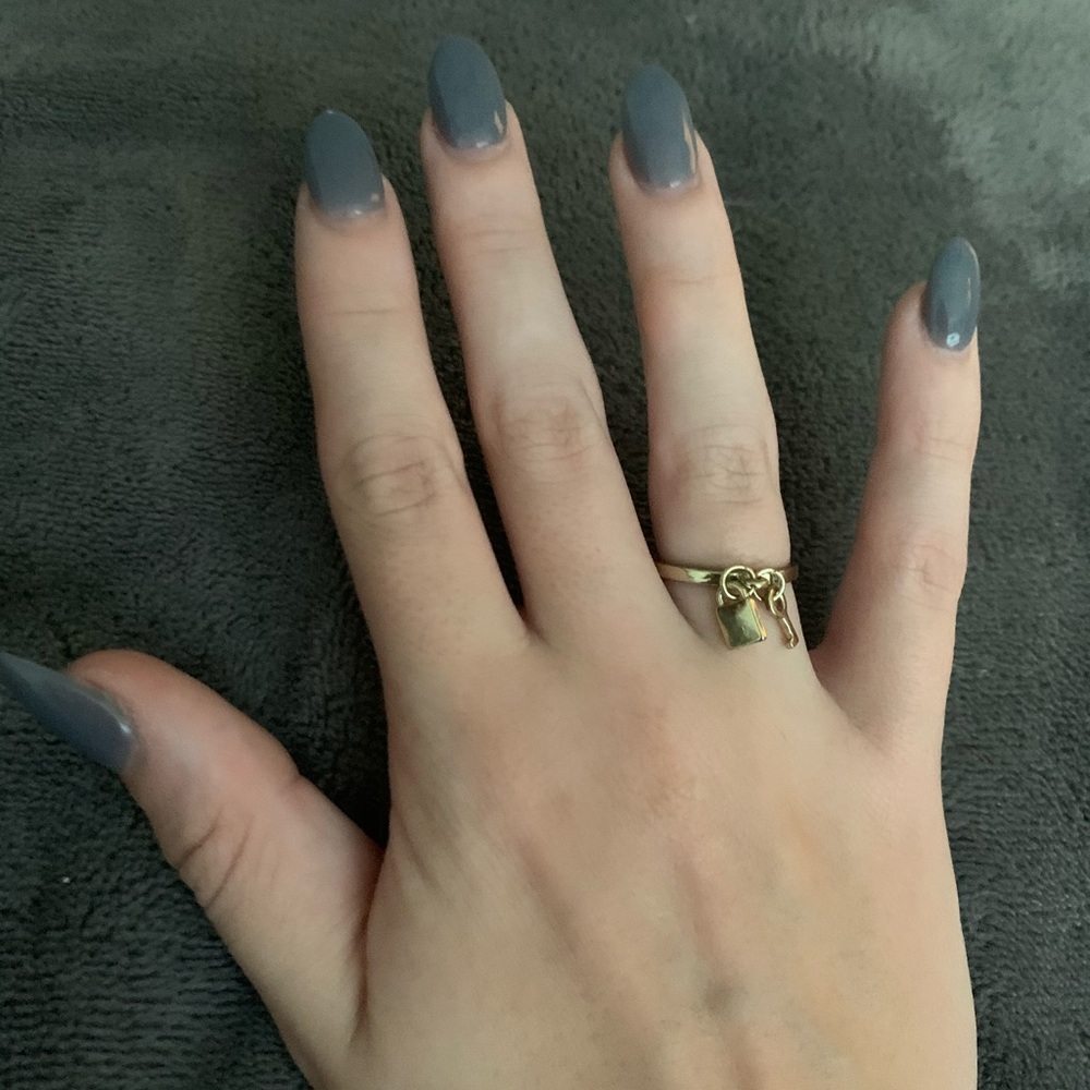 brand gold ring with lock and key